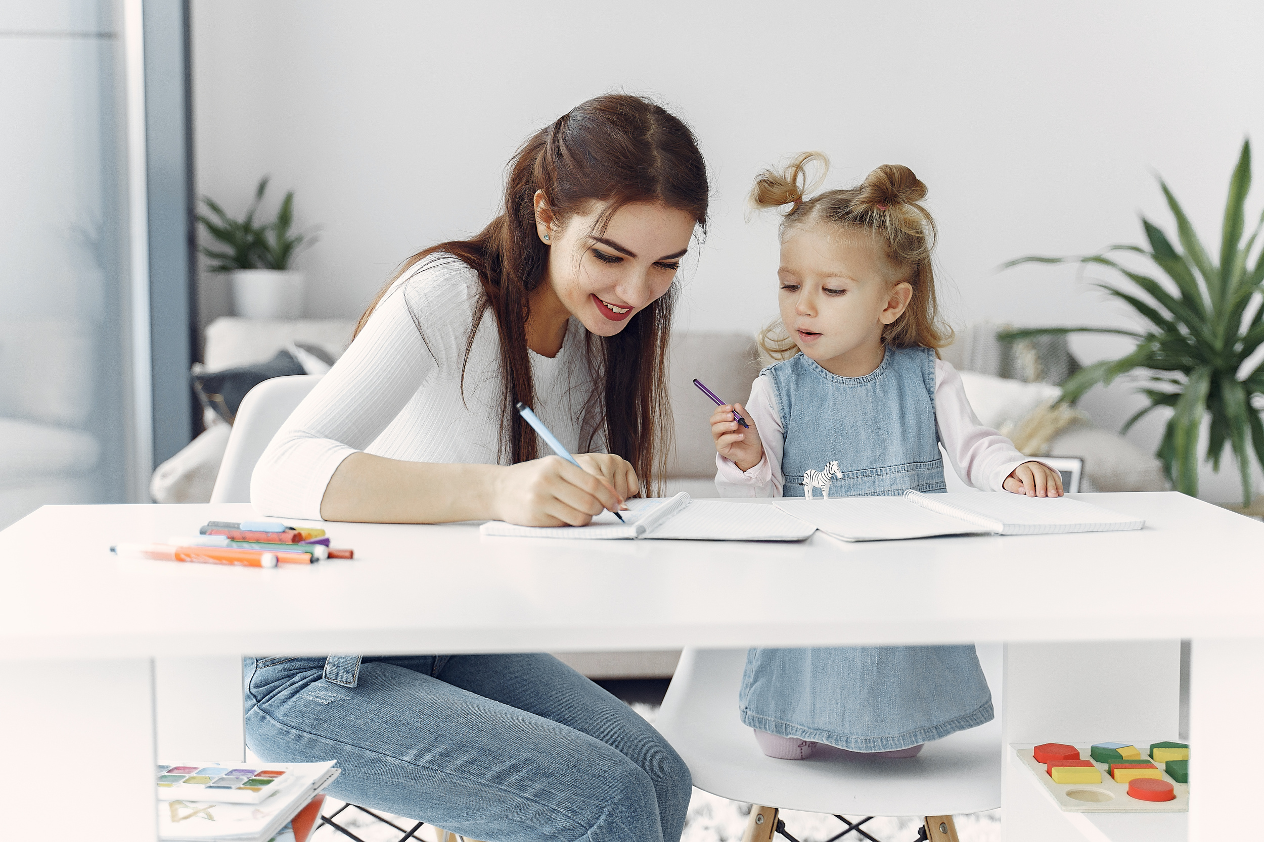 2 tutor-with-litthe-girl-studying-home.jpg