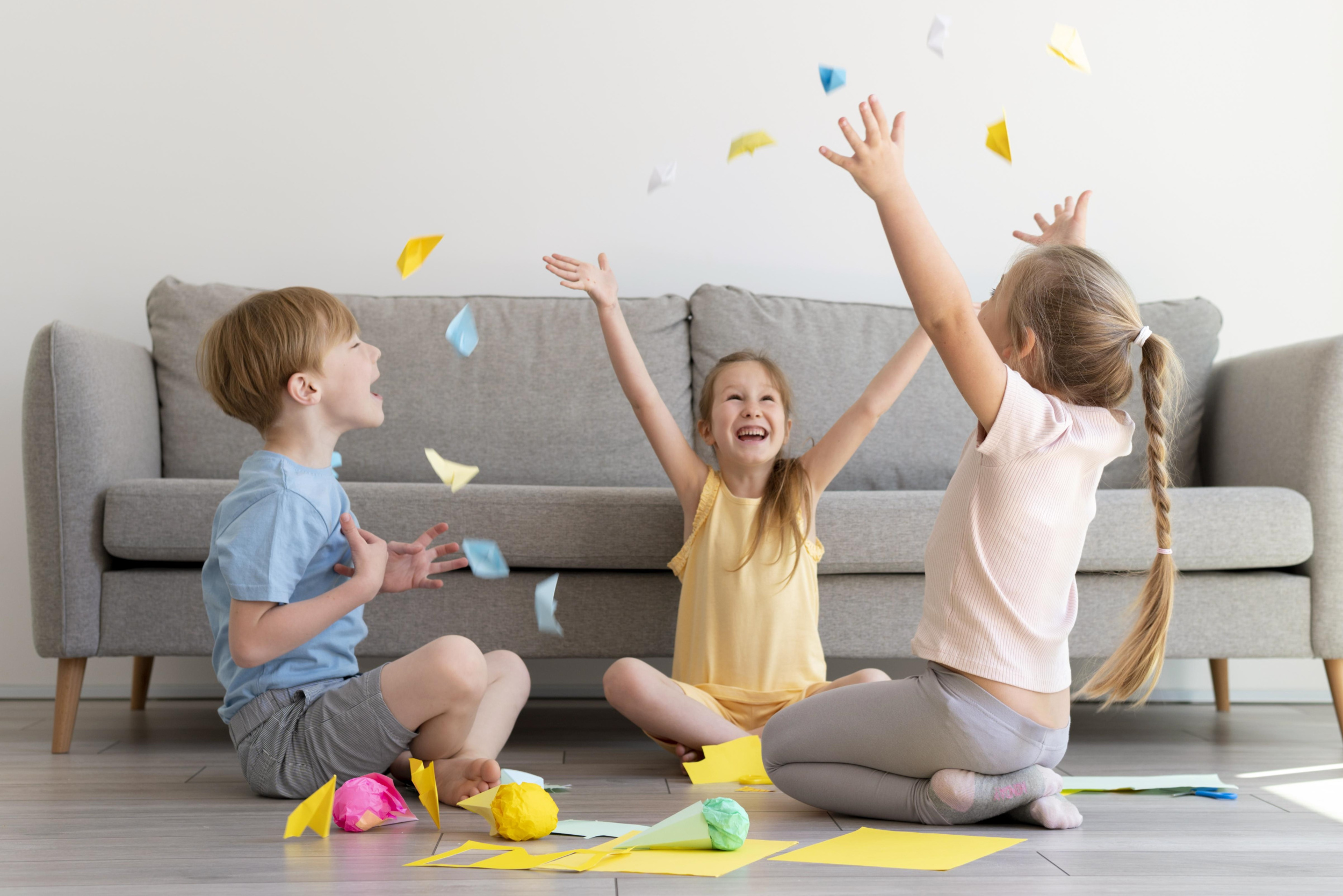 1 full-shot-kids-playing-with-paper.jpg