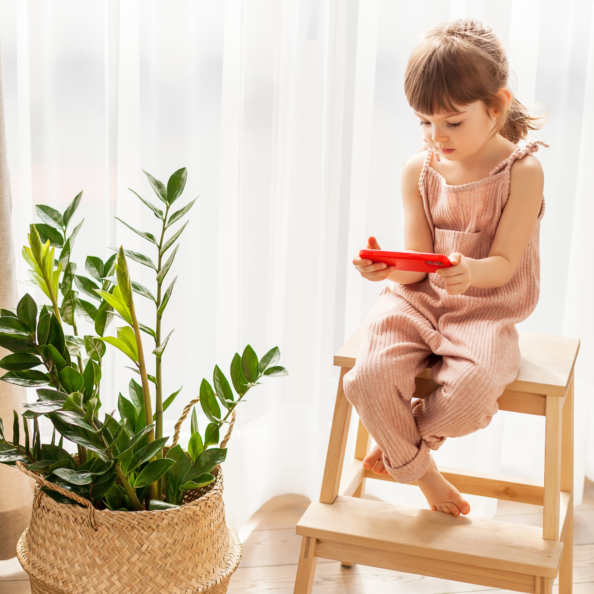 2 little-girl-with-mobile-phone-sitting-alone-she-is-watching-cartoons-smartphone-digital-generation-phone-addiction-concept.jpg